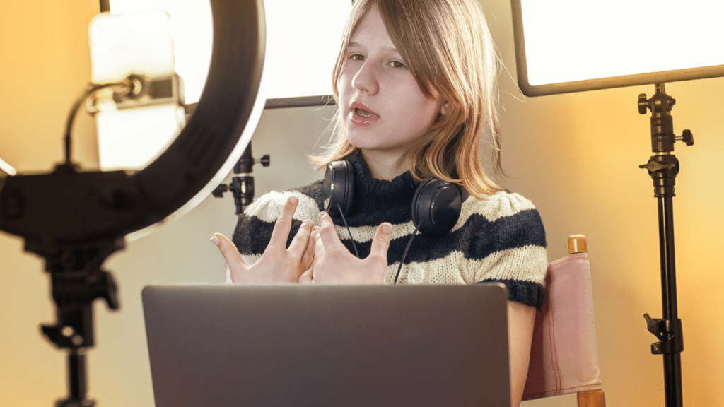 a person is sitting in front of a video camera