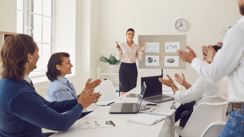 a group of business people working together in an office