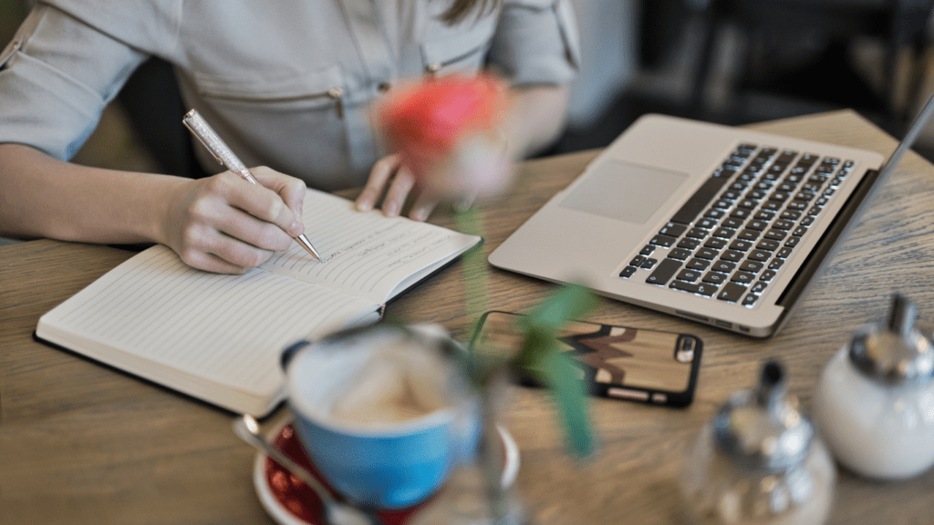 image of a person writing