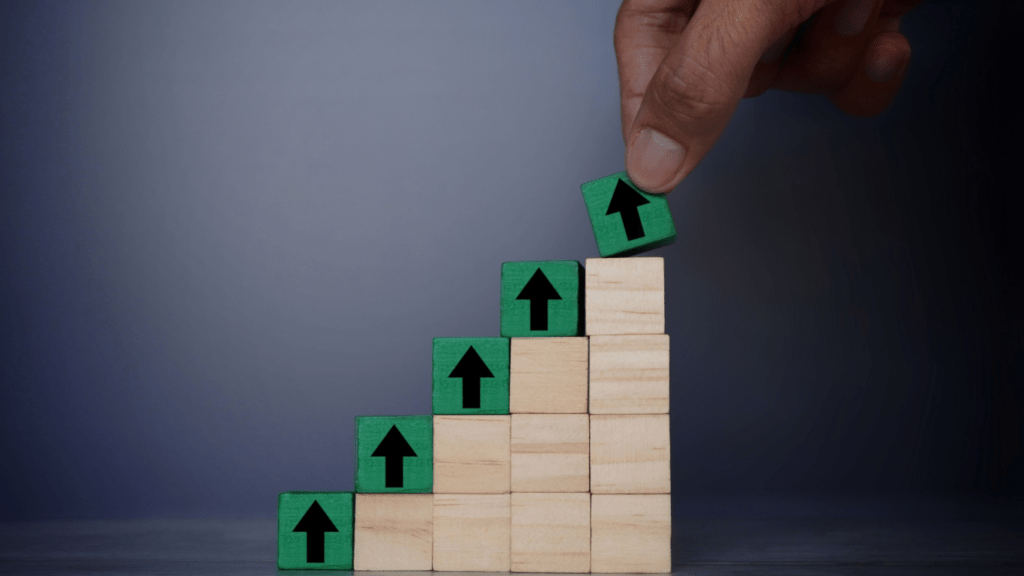 wooden blocks with arrows on top of them